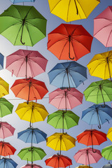 Fototapeta na wymiar multi-color umbrella display hanging high over a street in Jerusalem, Israel