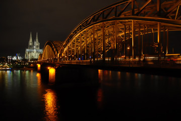 View on Hohenzollern Bridge, philharmonic hall, and Cologne Cathedral at night