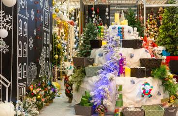 Fototapeta na wymiar Christmas decoration shop, decorated xmas trees