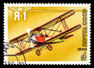 A stamp printed in the USSR show airplane Yak Ya-1