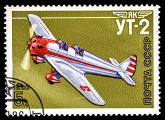 A stamp printed in the USSR show airplane Yak UT-2
