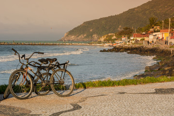 Pedaling at Sunset on the beach