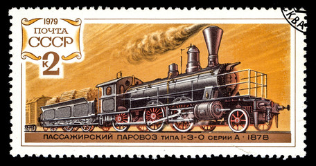 Fototapeta na wymiar A Stamp printed in the USSR shows vintage Russian steam locomotive, circa 1979