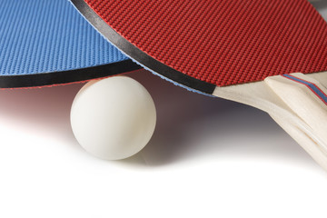 Red and Blue Ping Pong Paddles - Closeup On White