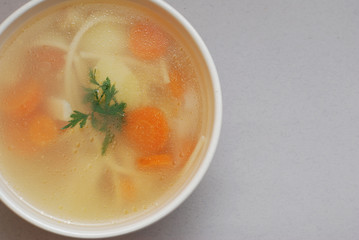 Bowl of chicken soup with vegetables and noodles - saved with clipping path