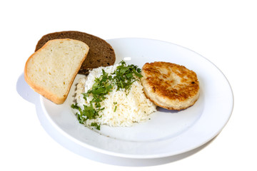 Cutlet with rice and bread isolated on white background