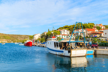 Fishing boats on blue sea in Rogoznica port, Dalmatia, Croatia