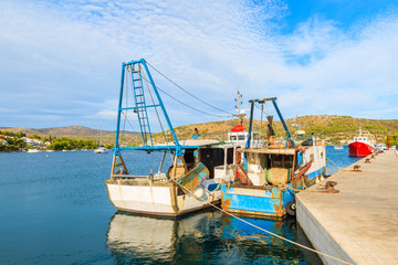 Fishing boats on blue sea in Rogoznica port, Dalmatia, Croatia