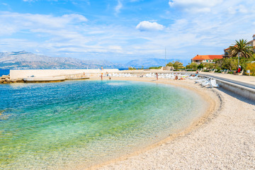 Beach with turquoise sea water in Postira village, Brac island, Croatia
