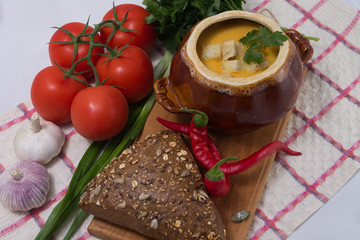 pumpkin cream soup in a pot