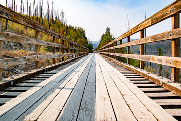 Fototapeta premium Historic Trestle Bridge and Railway near of Kelowna. Myra Canyon in British Columbia, Western Canada.