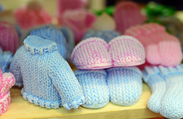 Natural handmade soaps in the form of sweater and slippers