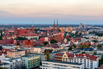 Fototapeta na wymiar Air view on the old town in Wroclaw in the evening from tower of St. Elizabeth's Church. Poland.