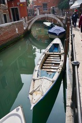 Fototapeta na wymiar Boat on Venice canal