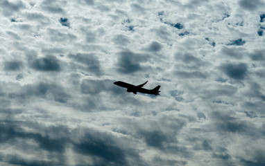 Jet Airplane Silhouette With White Cloud Background