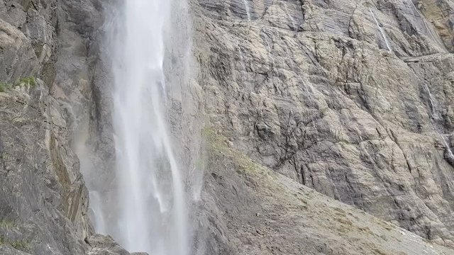 Cirque de Gavarnie in Hautes-Pyrenees, France during a rainy day. Camera panning