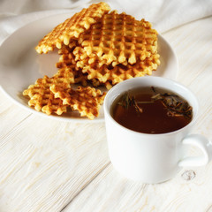 Tea with lemon and wafer