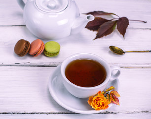 black tea in a white round cup with a saucer