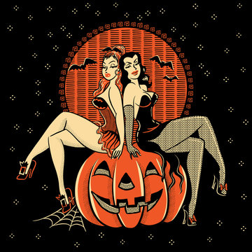 Spooky Halloween glamour twins sitting on a carved pumpkin head.