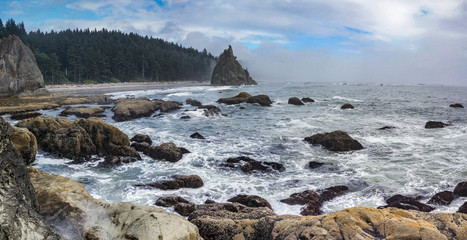 Sea Stack and Sea with Blue Sky and Clouds