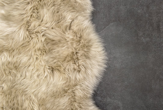 Sheep fur Sheepskin rug background stone texture