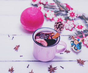 pink cup with mulled wine