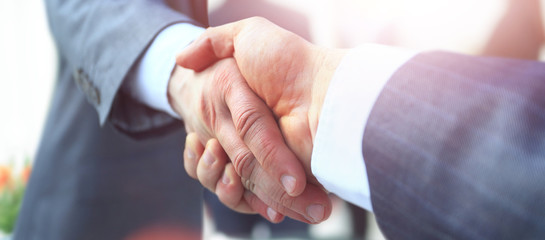 concept of cooperation.businessman handshake invites to cooperat