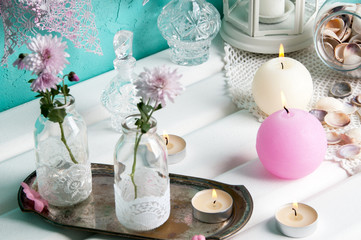 Obraz na płótnie Canvas Pink and cream aroma candles