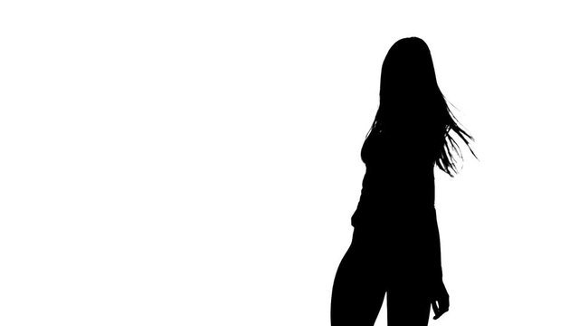 Girl is sexually wriggling her body. Silhouette. White background. Slow motion