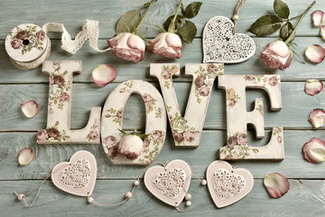 love background with vintage style letters and roses
