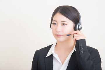 young asian woman with headset