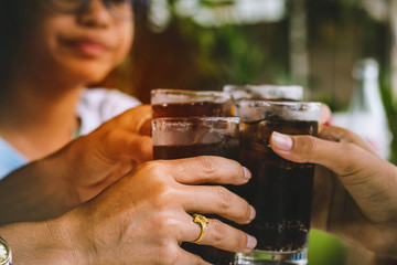 people drinking a soft drink with happy and fun.