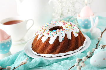 Bundt cake with sprinkles and easter eggs