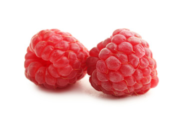 Ripe raspberries isolated on white background