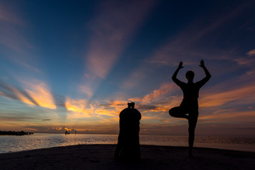 Clase de Yoga en la Playa