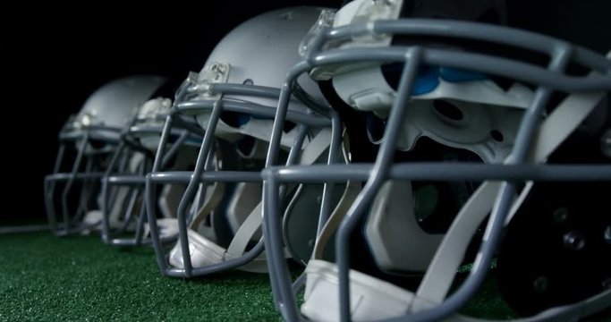 Head gears arranged on artificial turf 