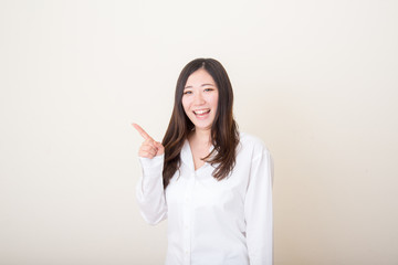 asian woman pointing with index finger