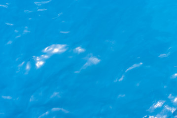 a deep blue sea water surface with highlights