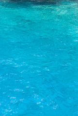 a deep blue sea water surface with highlights