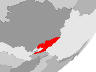 Kyrgyzstan in red on grey map