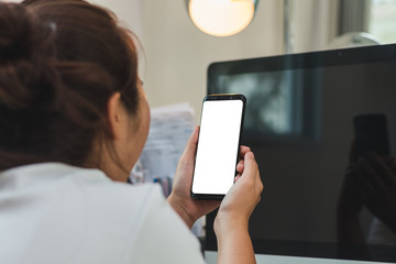 The worker woman looking at screen on smart phone