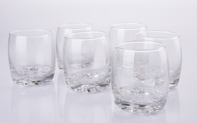glass cup or empty glass mug on background.