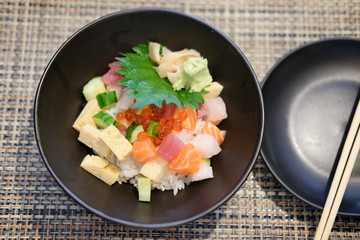 Japanese food with raw fishes and egg