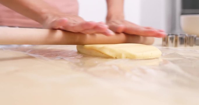 Rolling dough for making cookies at home