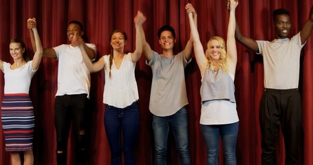 Actors bowing on the stage 