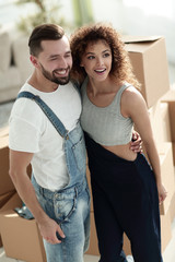 Happy couple in a new apartment.