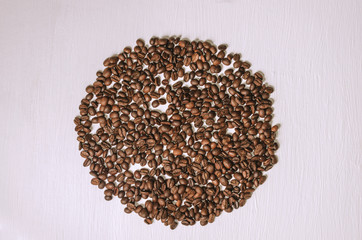 Frame of coffee beans with free space for text, white background top view