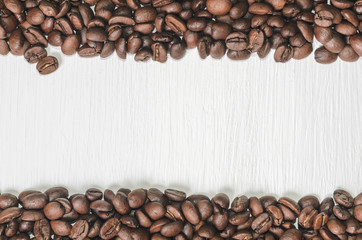 Frame of coffee beans with free space for text, white background top view