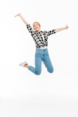 Full length image of happy ginger woman in shirt