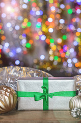 Christmas and New Year, gifts with blurred background of garlands close up
